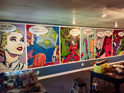 All panels filled in; retro comic wall mural feat. lyrics from Bohemian Rhapsody by Queen